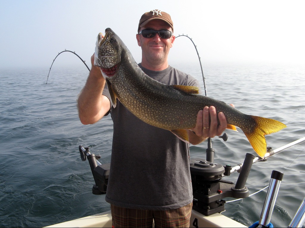 Henderson Harbor Fishing with Milky Way Charters - Tom with lunker Laker!