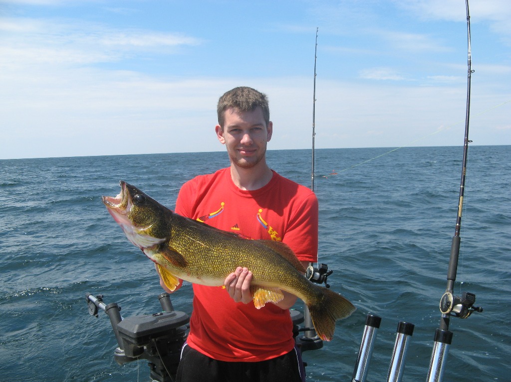 Henderson Harbor Fishing with Milky Way Charters - Jim with trophy 11.25 lb. Walleye!