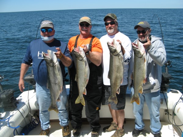 Scott Lillie Party Showing Off Big Lake Trout!