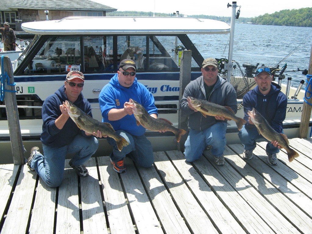 Henderson Harbor Fishing with Milky Way Charters - Tim Suiter with half their Spring Walleye catch