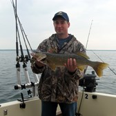 Henderson Harbor Fishing with Milky Way Charters - Jeremy Gracey Gold Star Feed Dairy Customer with Nice Walleye