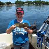 Henderson Harbor Fishing with Milky Way Charters - Derek Holding His Bass!