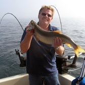 Henderson Harbor Fishing with Milky Way Charters - George getting in on the Laker action!