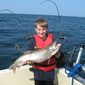 Henderson Harbor Fishing with Milky Way Charters - Andrew with his trophy Laker!