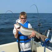 Henderson Harbor Fishing with Milky Way Charters - Jackson showing off his prized Laker