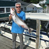 Henderson Harbor Fishing with Milky Way Charters - Bill Holding Lunker Laker!