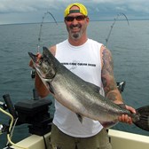 Henderson Harbor Fishing with Milky Way Charters - Chad showing off his King!