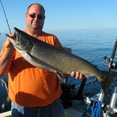 Henderson Harbor Fishing with Milky Way Charters - Big John with Big King!