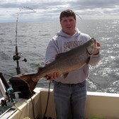 Henderson Harbor Fishing with Milky Way Charters - Paul with nice King!