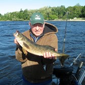 Henderson Harbor Fishing with Milky Way Charters - Carl displaying his Walleye!