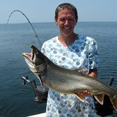Henderson Harbor Fishing with Milky Way Charters - Dawn Holding A Nice Lake Trout!