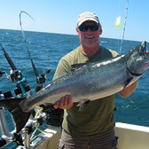 Henderson Harbor Fishing with Milky Way Charters - Matt Clark Displaying Nice Summer King!