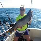Henderson Harbor Fishing with Milky Way Charters - Molly Showing off Her Lunker Lake Trout!