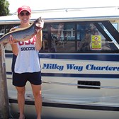 Henderson Harbor Fishing with Milky Way Charters - Twin Sister Emily Displaying Her Lake Trout!