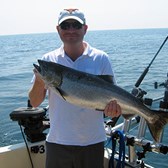 Henderson Harbor Fishing with Milky Way Charters - Dave Holding Nice King!