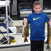 Henderson Harbor Fishing with Milky Way Charters - Johnny With Bass & Chain Pickerel!