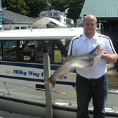 Henderson Harbor Fishing with Milky Way Charters - Reuben Holding Lake Trout!