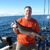 Henderson Harbor Fishing with Milky Way Charters - "J" Showing Off His King!