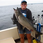 Henderson Harbor Fishing with Milky Way Charters - Danielle with Big King!