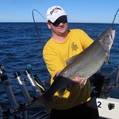 Henderson Harbor Fishing with Milky Way Charters - Matt holding a King!