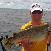 Henderson Harbor Fishing with Milky Way Charters - Matt with football Brown Trout!