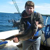 Henderson Harbor Fishing with Milky Way Charters - Abram Showing Off His Trout!