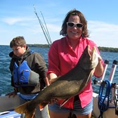 Henderson Harbor Fishing with Milky Way Charters - Taren Holding Trophy Lake Trout!