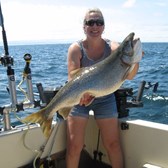 Jen Displaying 18 Pound Lunker Lake Trout!