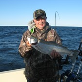 Henderson Harbor Fishing with Milky Way Charters - Tim Rooker Jr. with a nice brown trout!