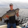 Henderson Harbor Fishing with Milky Way Charters - Trevor with nice King!
