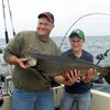 Henderson Harbor Fishing with Milky Way Charters - Neil with Son Dalton, Displaying His King!