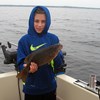 Henderson Harbor Fishing with Milky Way Charters - Johnny Showing Off Lunker Bass!