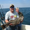 Henderson Harbor Fishing with Milky Way Charters - Mike Displaying His Laker!