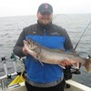 Henderson Harbor Fishing with Milky Way Charters - Matt Male Showing off His Trout